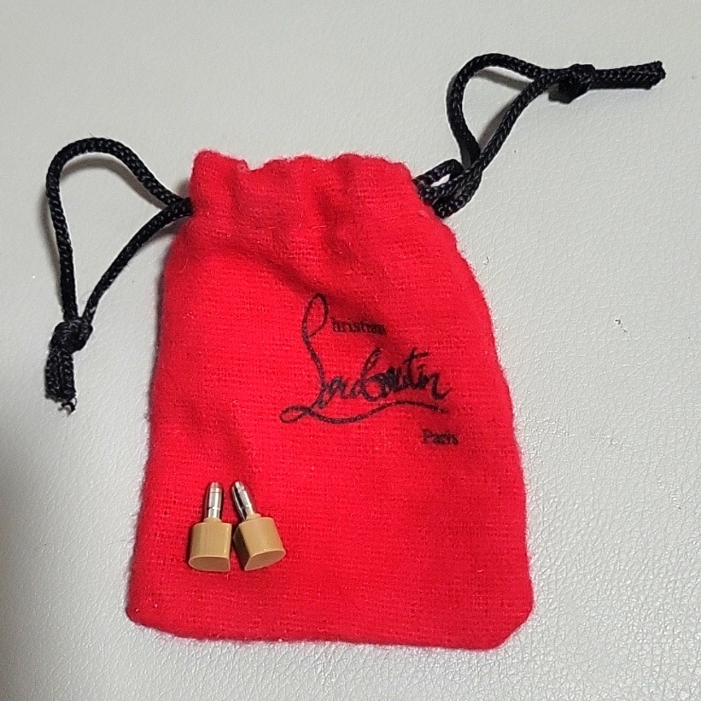 Christian Louboutin Tan Heel Tab